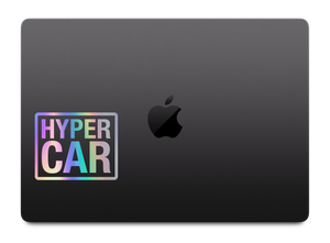 HYPERCAR holographic sticker applied to a MacBook lid